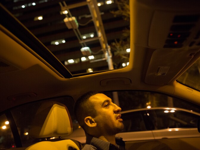 Tariq Abu Khumra drives home from New Horizons, where he takes computer programming classes, in his BMW.