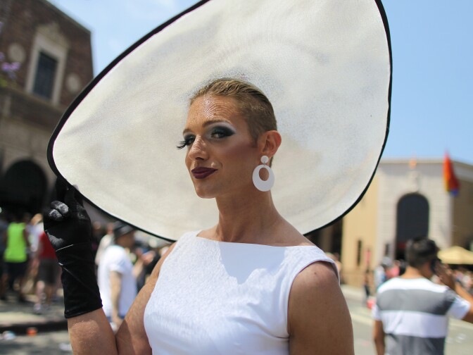 Cross dresser Roxy Baltimore walks down Santa Monica Boulevard at the 43rd L.A. Pride Parade on June 9, 2013 in West Hollywood, California. 