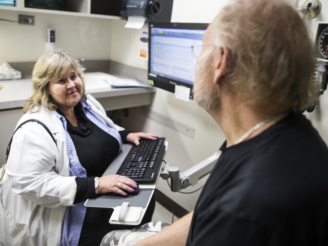 Family Nurse Practitioner Stacey Nadler, left, meets with client Chance Reardan, 66, during a check-up at Saban Community Clinic on Monday afternoon, Dec. 5, 2016. The Affordable Care Act expansion made a huge difference in the clinic's financial bottom line, says CEO Julie Hudman. The clinic was able to provide more services including shower services.