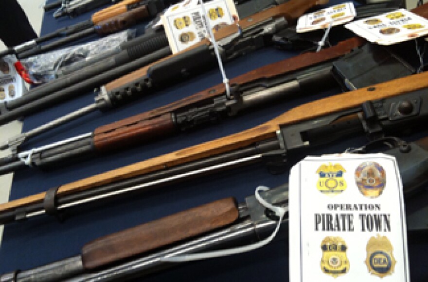 Police and federal officers arrested 80 alleged members of Rancho San Pedro gang whose members officials say trafficked guns and sold large amounts of drugs.