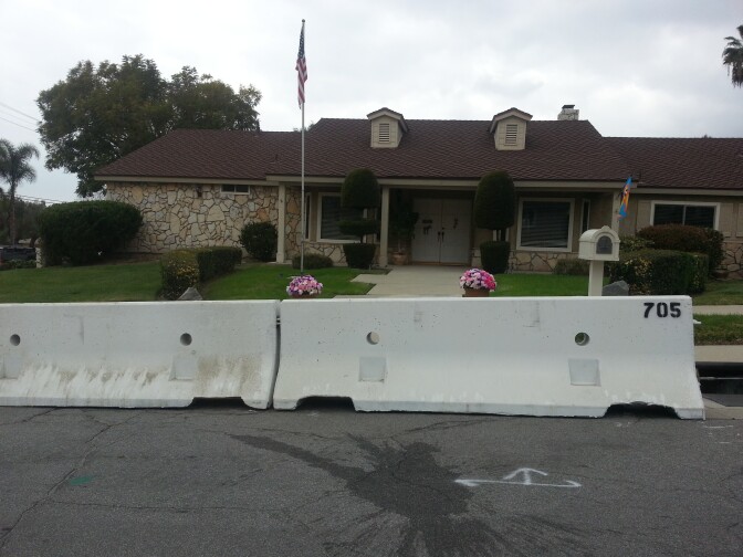 Glendora residents take necessary steps to protect their homes for the upcoming winter storms in Southern California on Feb. 26, 2014.