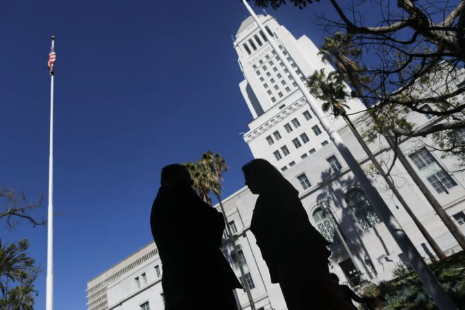 Mayoral Candidate Jan Perry speaks with Greig Smith, a Republican and former councilman from the San Fernando Valley. Smith has endorsed Perry in the mayor's race.
