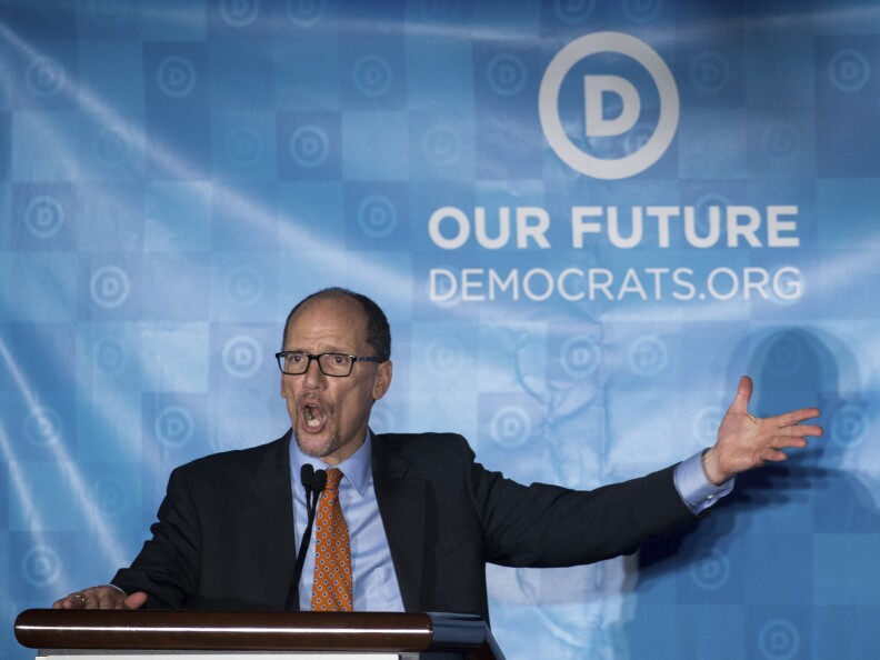 Newly elected Democratic National Committee Chairman Tom Perez gives a victory speech during the general session of the DNC winter meeting in Atlanta, Saturday, Feb. 25, 2017. Perez picked runner-up Rep. Keith Ellison, D-Minn, to be deputy chairman. (AP Photo/Branden Camp)