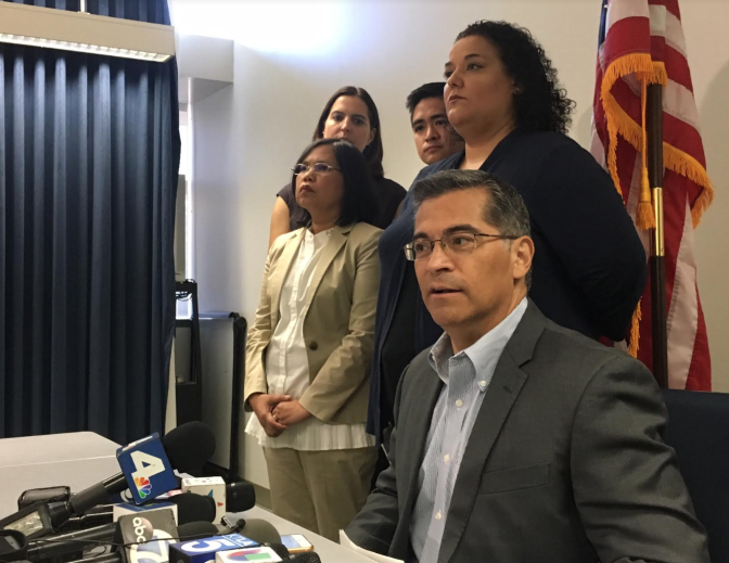 California State Attorney General Xavier Becerra responds to reporters' questions on Tuesday, Sept. 12, 2017, in downtown Los Angeles. Becerra met with local immigrant advocates to discuss next steps in the defense of the Deferred Action for Childhood Arrivals program, known as DACA. The Trump administration announced last week that it will end the program in March.