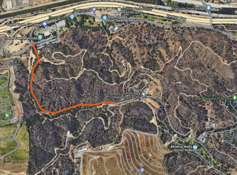 A satellite image shows an overhead view of Griffith Park, with a section of road closed to cars highlighted in orange.