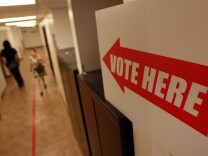 NORWALK, CA - OCTOBER 22:  Voters cast their ballots in early voting at the Los Angeles County Registrar of Voters office on October 22, 2008 in Norwalk, California. With less than two weeks left before the November 4 presidential election, early voting is underway in 31 states including California where Angelenos began casting their votes on October 6.  (Photo by David McNew/Getty Images)