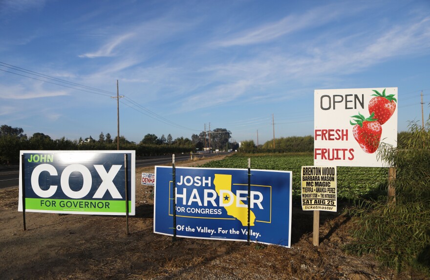 MODESTO, CA - OCTOBER 24:  A Josh Harder sign stands next to a fruit stand on October 24, 2018 in Modesto, California. Democratic congressional candidate Josh Harder (CA-10) is competing for the seat against Republican incumbent Rep. Jeff Denham. Democrats are targeting seven congressional seats in California, currently held by Republicans, where Hillary Clinton won in the 2016 presidential election. These districts have become the centerpiece of their strategy to flip the House and represent nearly one-third of the 23 seats needed for the Democrats to take control of the chamber in the November 6 midterm elections.  (Photo by Mario Tama/Getty Images)