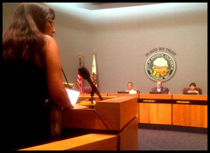 Joanne Sosa of "Take Back Anaheim" asked Anaheim's city council members not to cancel next week's scheduled public discussion at Anaheim High School. 