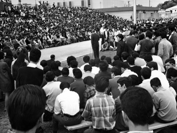 Garfield High School students gather for a special assembly on March 7, 1968, as principal Reginald Murphy (center) appeals to students to return to class.