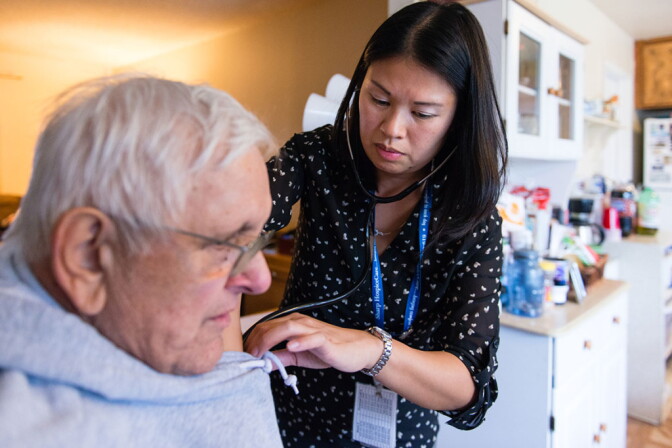 Nurse Sheri Juan gives Gerald Chinchar a checkup as part of the Sharp HealthCare Transitions program.