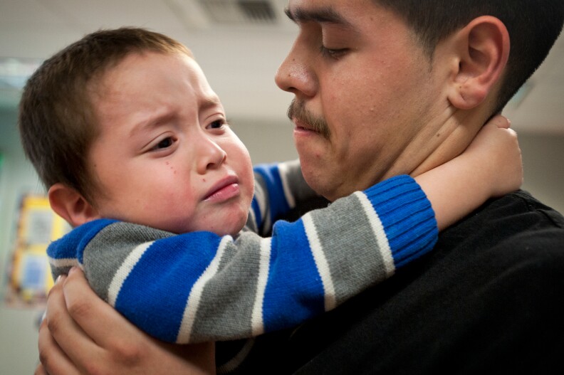 Two-year-old Andrew cries when Roger Razo has to go pick up Andrew's mother. Since 1999, about 60% of students have graduated and gone on to higher education.