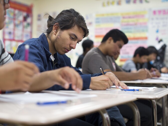 Senior Javier Chio works on a Wassily Kandinsky-inspired art project during a geometry class at Hawthorne High School on Tuesday, June 2, 2015. The painter is most well known for his Bauhaus period in which he made abstract works using shapes and lines. 