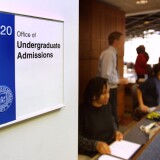ANN ARBOR, MI - JANUARY 17:  Workers staff the front desk of the University of Michigan's Undergraduate Admissions office January 17, 2003 in Ann Arbor, Michigan. The University's admissions policy is the subject of a U.S. Supreme Court case. U.S. President George W. Bush opposes the university's affirmative action program.  (Photo by Bill Pugliano/Getty Images)