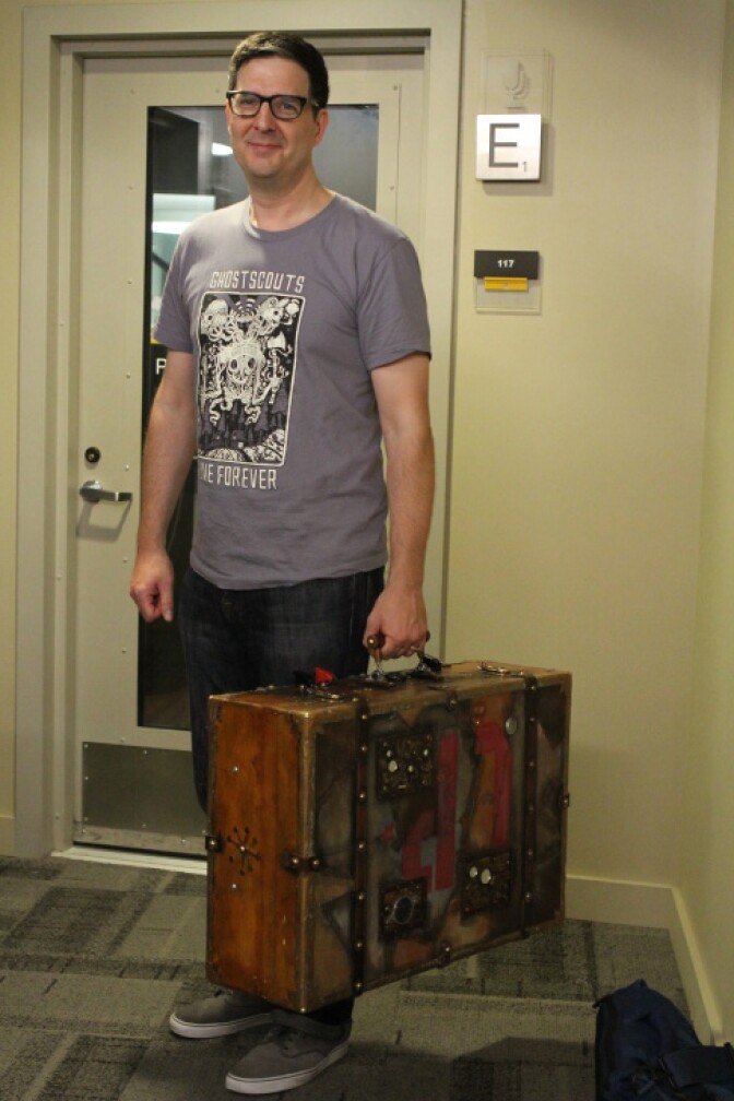 Filmmaker Marc Osborne with his "magic suitcase" which he used to pitch "The Little Prince" film financiers, artists, actors and everyone who ever would work on the movie.