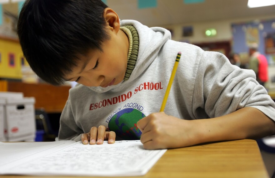 Charlie So takes a test at Escondido Elementary School in Palo Alto, Calif., in 2006. 