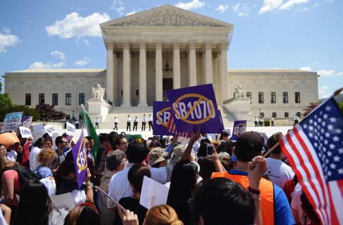 Protesters opposed to Arizona's immigration law SB 1070 in front of the U.S. Supreme Court earlier this year.