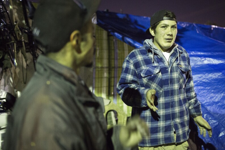 Eighteen-year-old Frank Taylor, right, has been living on Aetna Street near Tyrone Avenue in Van Nuys since May 2016. Taylor was born and raised in Los Angeles.