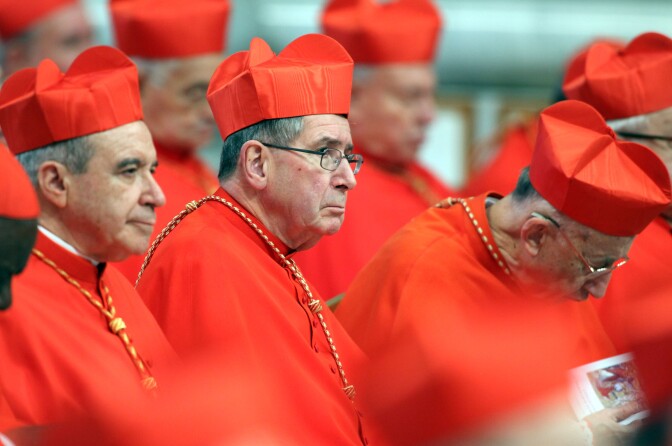 VATICAN CITY, VATICAN - FEBRUARY 18:  Cardinal Roger Mahony former archbishop of Los Angeles  (C) attends the concistory held by Pope Benedict XV at the Saint Peter's Basilica  on February 18, 2012 in Vatican City, Vatican. The 84 year old Pontiff installed 22 new cardinals during the ceremony, who will be responsible for choosing his sucessor.  (Photo by Franco Origlia/Getty Images)