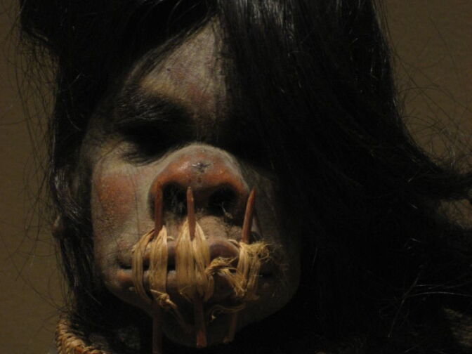 The newest Bowers Museum exhibit includes two shrunken heads, including this one from Ecuador in the early 20th century.  The warrior created the head from a rival killed in battle.  The warrior sewed the mouth shut to keep in - and carry around - the rival's power.