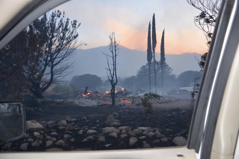 A photo from the Kern County Fire Department shows a new wildfire that broke out late Thursday, June 23, 2016, quickly tearing through dozens of homes and prompting evacuations.