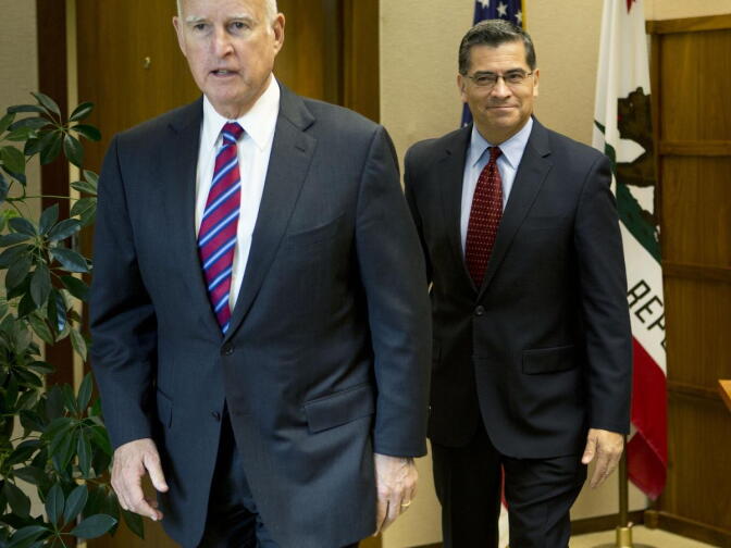 Gov. Jerry Brown with Rep. Xavier Becerra (D-Los Angeles), his choice for California attorney general.