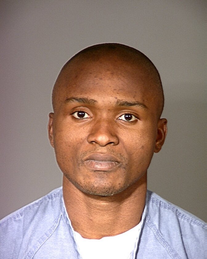 A booking photo provided by the Ventura County Sheriff's Office of the man now known as Charly Keunang, but at the time went by Charly Robinet.