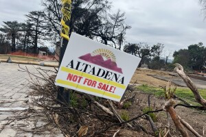 A sign reads "Altadena Not For Sale!"