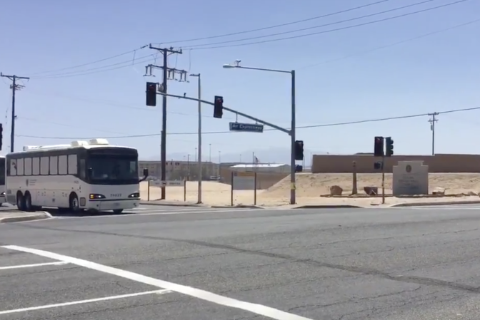 Busloads of immigration detainees arrive in June 2018 at the federal prison facility in Victorville. 