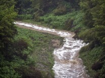 Water flows at Devil's Gate Dam in Pasadena on Tuesday morning, Sept. 15, 2015. Rainfall reached record levels in areas of Los Angeles.