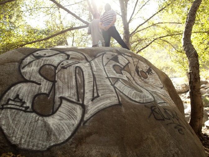 Graffiti is abundant along a section of the East Fork of the San Gabriel River. With President Obama's designation that part of the San Gabriel Mountains become a national monument, there will be more protection against litter and graffiti.
