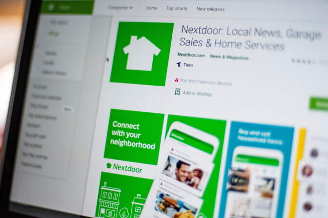 Nextdoor, the hyper local social network, is seen on a computer screen in Washington, DC, on March 27, 2020. - There are offers to pick up groceries or medicine for neighbors, to share supplies, or walk people's dogs. And exchange information on where to find scarce items like toilet paper.  For people forced to stay home to ride out the coronavirus pandemic, Nextdoor, the hyperlocal social network, has found itself playing an increasingly important role. (Photo by Eric BARADAT / AFP) (Photo by ERIC BARADAT/AFP via Getty Images)