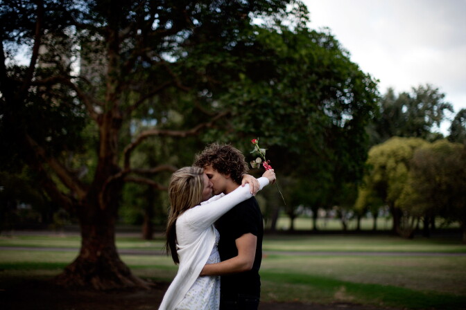 MELBOURNE, AUSTRALIA - FEBRUARY 14:  A couple kisses on Valentine's Day, February 14, 2008 in Melbourne, Australia. The day is named after two of 11 officially recognised Early Christian martyrs named Valentine, namely Valentine of Rome and Valentine of Terni, and has been associated with love and romance since Chaucer's 1382 writings in 'Parlement of Foules' to honour the first anniversary of the engagement of King Richard II of England to Anne of Bohemia.  (Photo by Kristian Dowling/Getty Images)