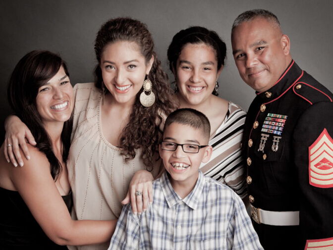A United States Marine before deployement, with family