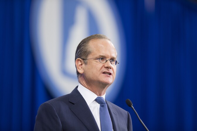 Democratic presidential candidate Lawrence Lessig speaks on stage at the New Hampshire Democratic Party State Convention on September 19, 2015.