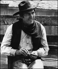 Jack Palance, rolling a cigarette between scenes of the film <em>Monty Walsh</em>.