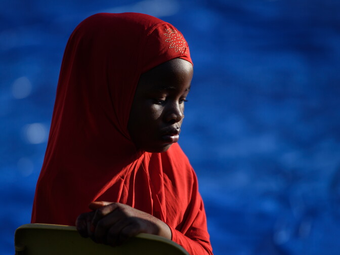 PITTSBURGH, PA - JUNE 25: Eheze Hassani, 8, of Sharpsburg, Pennsylvania, waits for the prayer to begin during an Eid al-Fitr celebration, which marks the end of Ramadan, on June 25, 2017 in Pittsburgh, Pennsylvania. The celebration marks the ending of the fasting month of Ramadan and the beginning of Shawwal and six more days of fasting.. Becasue Eid al-Fitr starts when the new moon is spotted, it is celebrated on different days around the world.   (Photo by Justin Merriman/Getty Images)