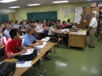 Victory Huey teaches the morning Citizenship Class at Evans Adult School in downtown Los Angeles near Chinatown.  Eighty immigrants from all over the world are enrolled in the class.  Maintaining eye-contact during the verbal interview is a point Huey covers during the preparation process.
