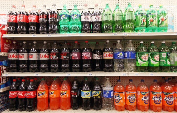 NEW YORK, NY - MAY 31:  Two-liter bottles of regular and diet soda are seen for sale at a Manhattan store on May 31, 2012 in New York City. New York City Mayor Michael Bloomberg is proposing a ban on sodas and sugary drinks that are more than 16 ounces in an effort to combat obesity. Diet sodas would not be covered by the ban and many grocery stores would be exempt.  (Photo by Mario Tama/Getty Images)