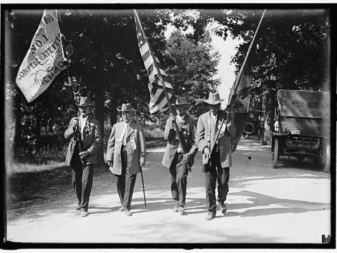 Veterans of the Union and Confederate armies march at the encampment in July 1913 during the Great Reunion, commemorating the 50th anniversary of the Battle of Gettysburg