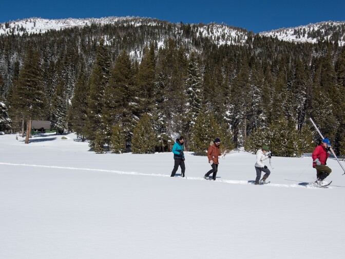 A team of science fellows Dylan Chapple, Ph.D., from the Assembly Natural Resources Committee, left, Keith Cialino, Ph.D., with the Assembly Water, Parks and Wildlife Committee and Amy Gilson, Ph.D., from the Assembly Environmental Safety and Toxic Materials Committee assist Frank Gehrke, Chief of the California Cooperative Snow Surveys Program, with the third snow survey of the 2018 snow season at Phillips Station in El Dorado County. The survey site is in the Sierra Nevada Mountains approximately 90 miles east of Sacramento off Highway 50.  Photo taken March 5, 2018.

Kelly M. Grow/ California Department of Water Resources, FOR EDITORIAL USE ONLY