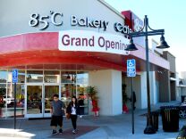 WEST COVINA, Calif. -- Customers emerge from the storefront at the new 85°C Bakery Cafe on Jan. 16. This company-owned West Covina location is the third to open in the United States, with more openings planned throughout Southern California. The Taiwan-based chain, while new to the U.S. market, operates more than 700 stores worldwide.