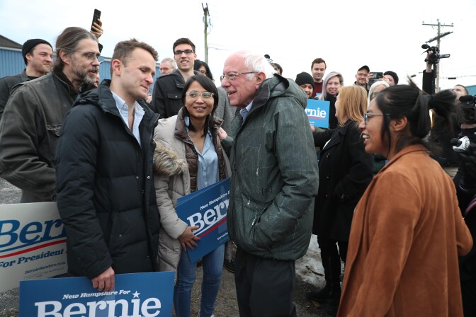 MANCHESTER, NEW HAMPSHIRE - FEBRUARY 04: Democratic presidential candidate Sen. Bernie Sanders (I-VT) greets a group of supporters after arriving in New Hampshire on February 04, 2020 in Manchester, New Hampshire. Mr. Sanders arrived in New Hampshire to campaign leading up to the primary on February 11 as he awaits the release of the results from the Iowa caucus. (Photo by Joe Raedle/Getty Images)