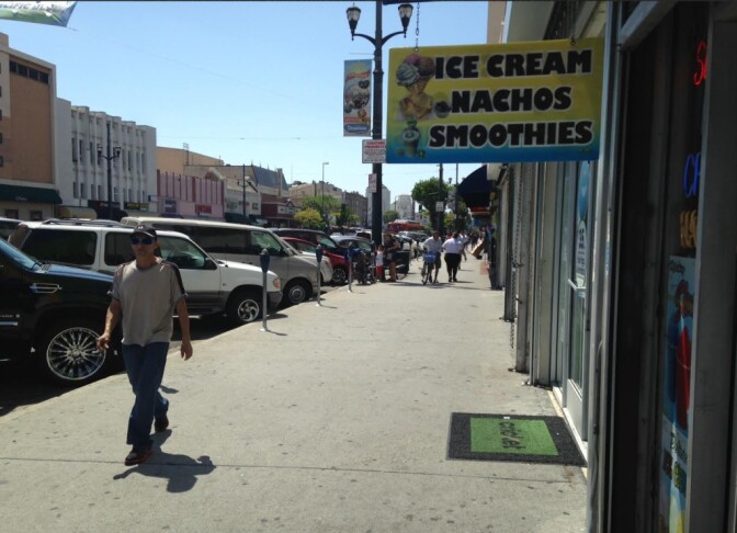 The Pacific Boulevard commercial district in Huntington Park. The city's population is more than 97 percent Latino and half foreign born.