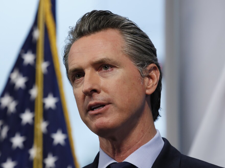 California Gov. Gavin Newsom, shown here earlier this month, has explained how the state will decide to lift restrictions imposed due to the coronavirus pandemic.