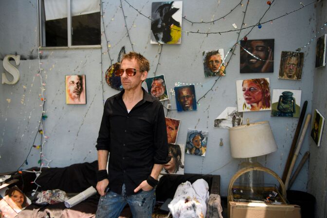 Artist Scott A Dickinson, who was formerly homeless before moving into a shared housing program stands for a portrait at his home on June 16, 2021 in near Venice Beach in Los Angeles, California. - Ah yes, Venice Beach in California: synonymous with sun, surf, palm trees and, now, homeless people.
As many as 200 tents inhabited by them line the oceanfront in this Los Angeles-area town that for decades has been a lure for surfers and tourists.
For them home is a chaotic jumble of used-anything that can help create shelter, and of waste and detritus, all in appalling hygiene conditions. Here, the smell of urine competes with that of sun tan lotion. (Photo by Patrick T. FALLON / AFP) (Photo by PATRICK T. FALLON/AFP via Getty Images)