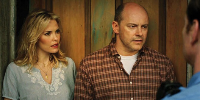 Leslie Bibb and Rob Cordry in "Hell Baby."