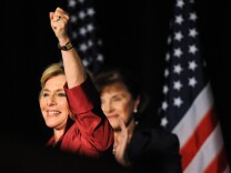 Senator Barbara Boxer (L) celebrates with Senator Dianne Feinstein (R) after winning a fourth term, in the Democratic Party headquarters at the Renaissance Hotel in Hollywood on November 3, 2010. The nation's mood was dark as Democrats rallied desperately to defend President Barack Obama and angry Republicans hoped to deliver a crippling rebuke. There was little of the festive atmosphere that swept the country two years ago when Obama was elected the nation's first black US president. The mid-term elections see the lower house of Congress, plus over a third of the Senate and most governors' mansions up for grabs. But many consider the vote is a referendum on Obama himself.               AFP PHOTO/Mark RALSTON (Photo credit should read MARK RALSTON/AFP/Getty Images)