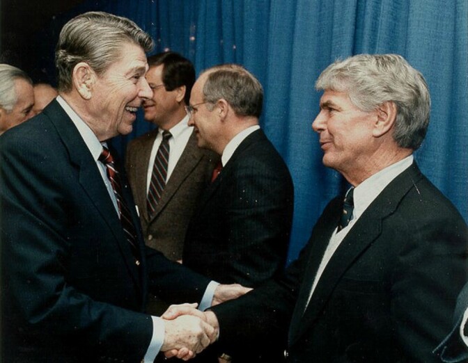 Jerry Lewis (R) shakes hands with Ronald Reagan (L)
