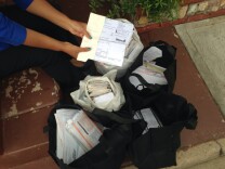 Isabel Medina of East Los Angeles and her husband have saved bags full of receipts, bills and other documents to prove their long-term residency in the United States. Both hope to obtain temporary legal status under Obama's executive immigration plan, as the parents of two U.S. citizen children. 