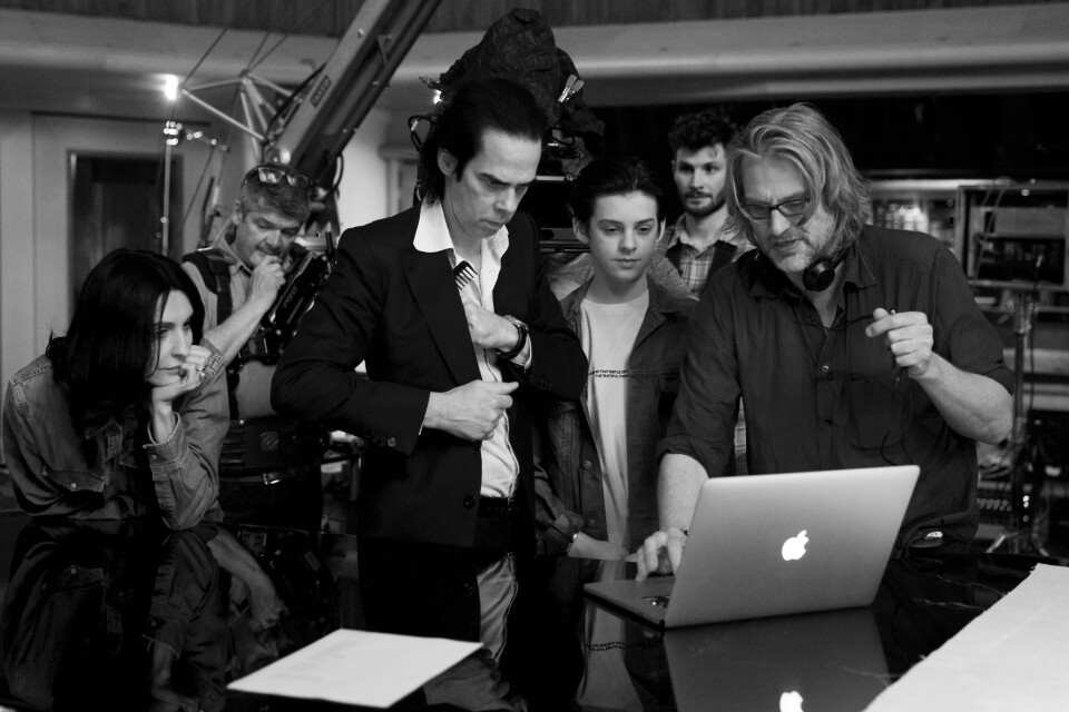 (L-R) Nick Cave's wife Susie Cave, Nick Cave, Earl Cave and Andrew Dominik watch footage from the "Skeleton Tree" recording session.